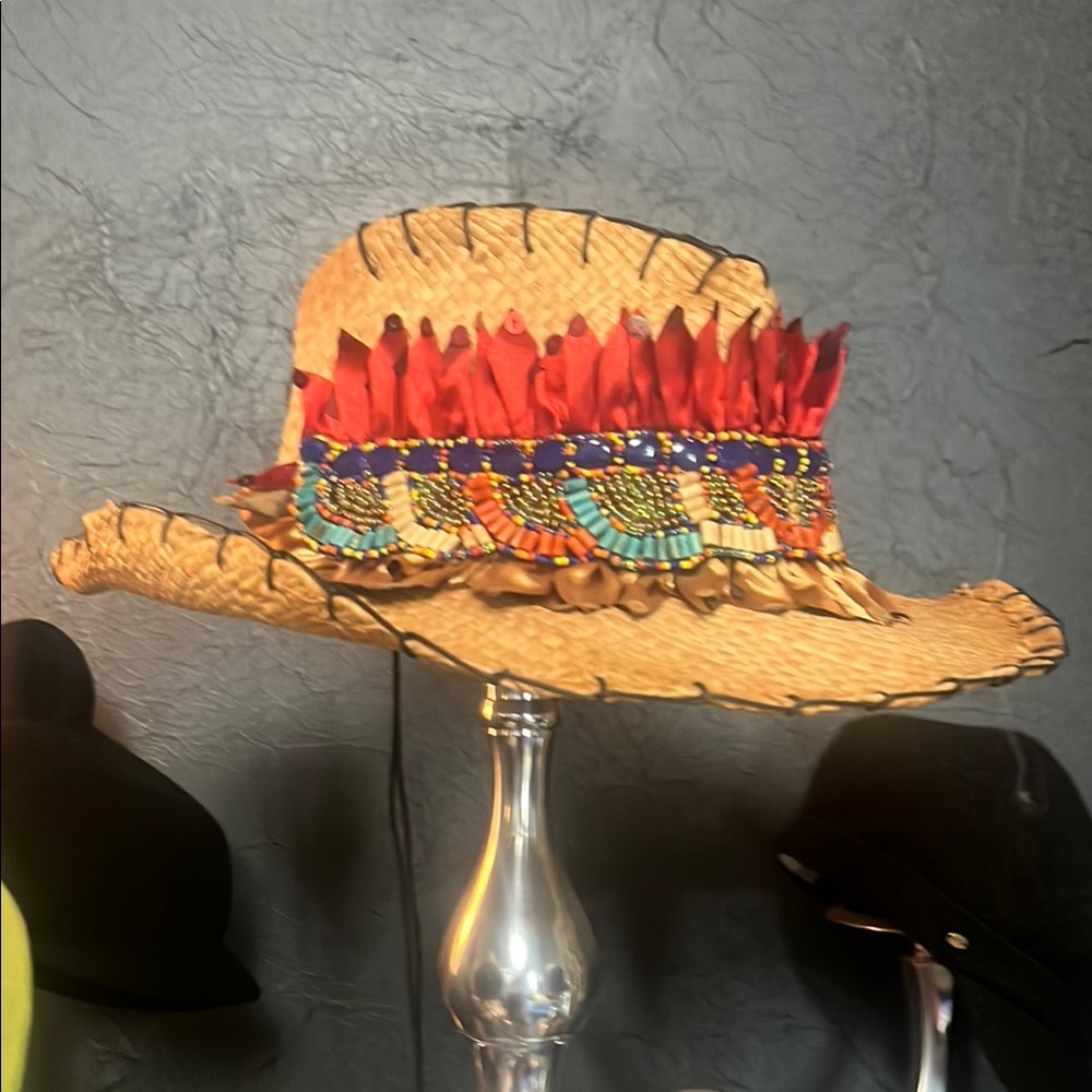 Red and Blue Decorative Hat with Wide Brim and Colorful Accents